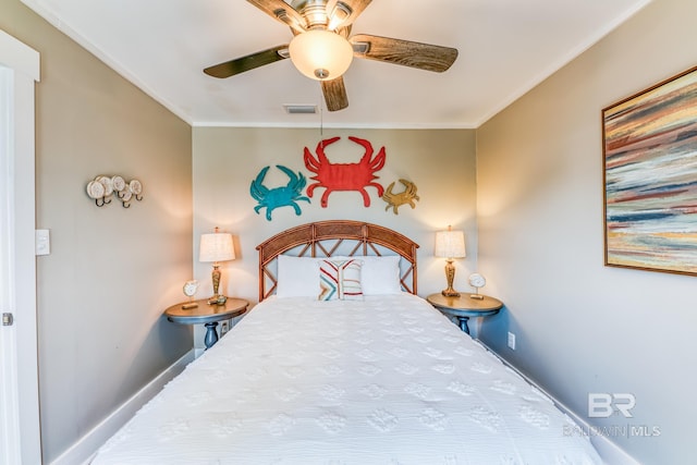 684 Chickasaw Rd, Gulf Shores, AL 36542 - bedroom with ornamental molding and ceiling fan