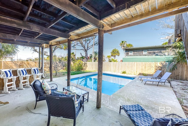 684 Chickasaw Rd, Gulf Shores, AL 36542 - view of swimming pool featuring a fenced backyard and a patio