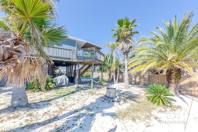 684 Chickasaw Rd, Gulf Shores, AL 36542 - view of yard featuring stairway and a deck