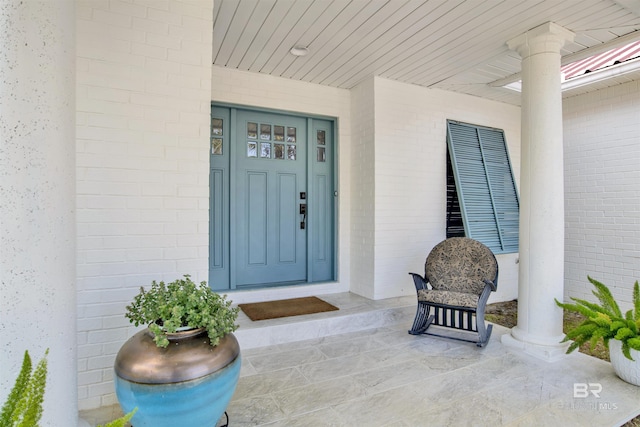 property entrance with covered porch