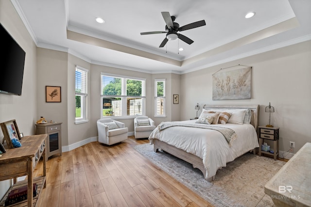 1609 Makaira Dr, Foley, AL 36535 - bedroom featuring a tray ceiling, light wood-style floors, ornamental molding, recessed lighting, and baseboards