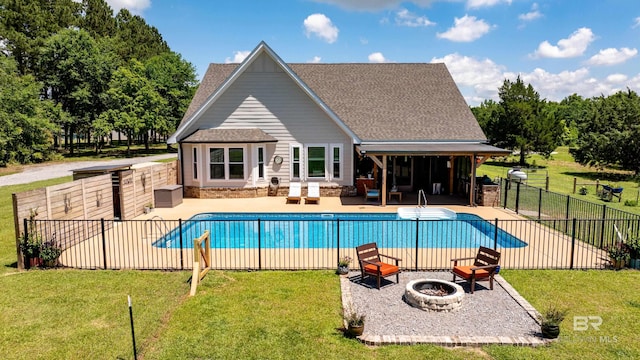 1609 Makaira Dr, Foley, AL 36535 - view of swimming pool featuring a fire pit and a patio