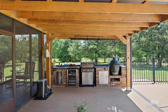 1609 Makaira Dr, Foley, AL 36535 - view of patio / terrace with beverage cooler and view of scattered trees