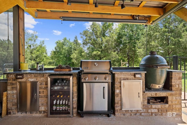 1609 Makaira Dr, Foley, AL 36535 - view of patio featuring wine cooler and view of wooded area