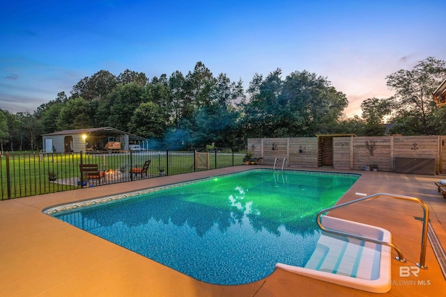 1609 Makaira Dr, Foley, AL 36535 - view of swimming pool featuring a patio area and view of wooded area