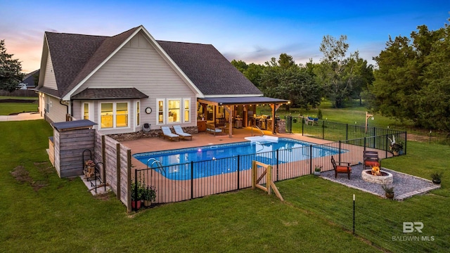 1609 Makaira Dr, Foley, AL 36535 - view of swimming pool featuring an outdoor fire pit and a patio