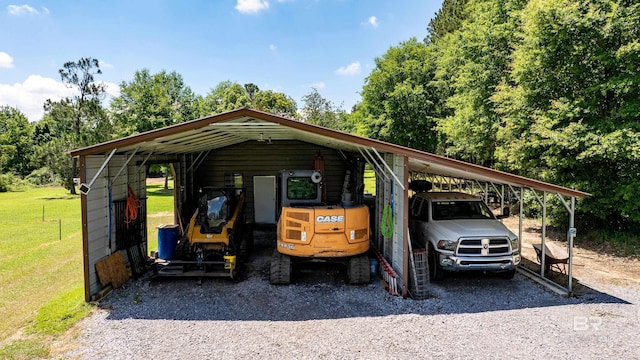 1609 Makaira Dr, Foley, AL 36535 - view of vehicle parking featuring driveway and a carport
