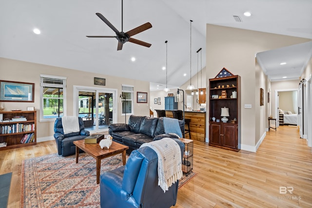 1609 Makaira Dr, Foley, AL 36535 - living area with high vaulted ceiling, a ceiling fan, light wood finished floors, baseboards, and recessed lighting