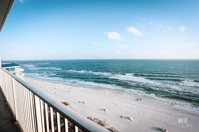 view of water feature with a beach view