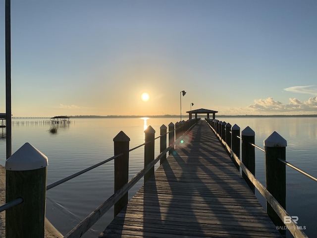 view of dock with a water view