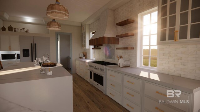 16880 Brigadoon Trl, Gulf Shores, AL 36542 - kitchen with white appliances, open shelves, wood finished floors, light countertops, and white cabinets