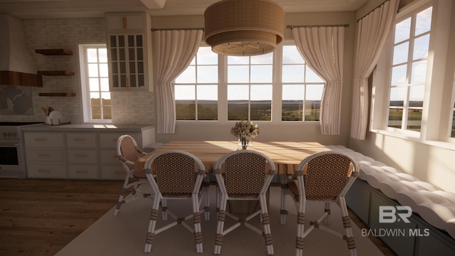 16880 Brigadoon Trl, Gulf Shores, AL 36542 - dining space featuring wood finished floors