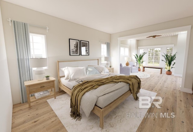 16880 Brigadoon Trl, Gulf Shores, AL 36542 - bedroom with light wood-style flooring