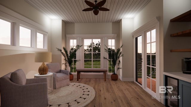16880 Brigadoon Trl, Gulf Shores, AL 36542 - living area with light wood-style flooring, a ceiling fan, healthy amount of natural light, and wooden ceiling