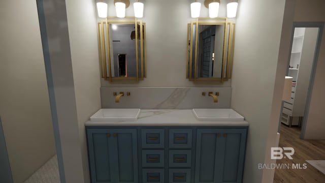 16880 Brigadoon Trl, Gulf Shores, AL 36542 - full bathroom with wood finished floors and double vanity