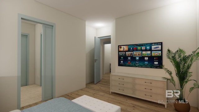 16880 Brigadoon Trl, Gulf Shores, AL 36542 - bedroom with light wood finished floors