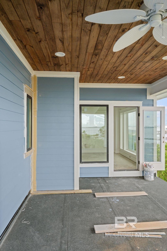 16880 Brigadoon Trl, Gulf Shores, AL 36542 - property entrance with ceiling fan and uncovered parking