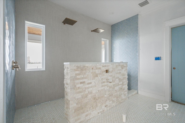 16880 Brigadoon Trl, Gulf Shores, AL 36542 - full bath featuring tile walls, a walk in shower, and tile patterned floors