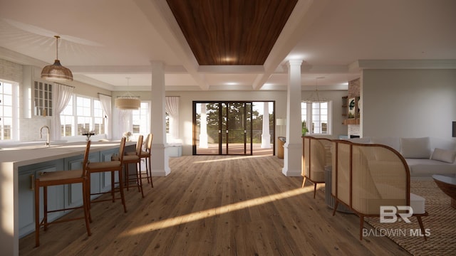 16880 Brigadoon Trl, Gulf Shores, AL 36542 - living room featuring decorative columns, wood finished floors, beamed ceiling, and coffered ceiling