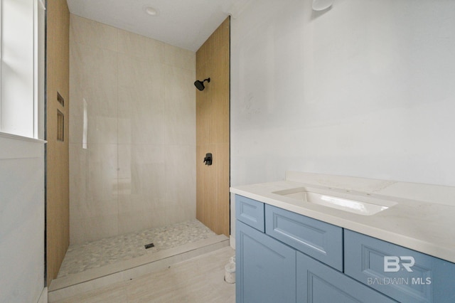16880 Brigadoon Trl, Gulf Shores, AL 36542 - bathroom with a tile shower and vanity