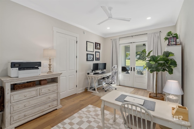 office area with french doors, light hardwood / wood-style floors, and ceiling fan