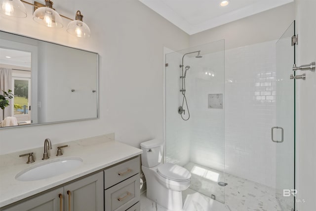 bathroom with vanity, toilet, walk in shower, and crown molding