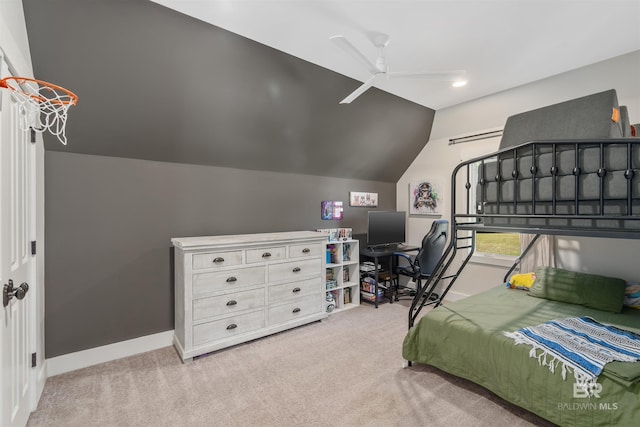 carpeted bedroom with ceiling fan and lofted ceiling