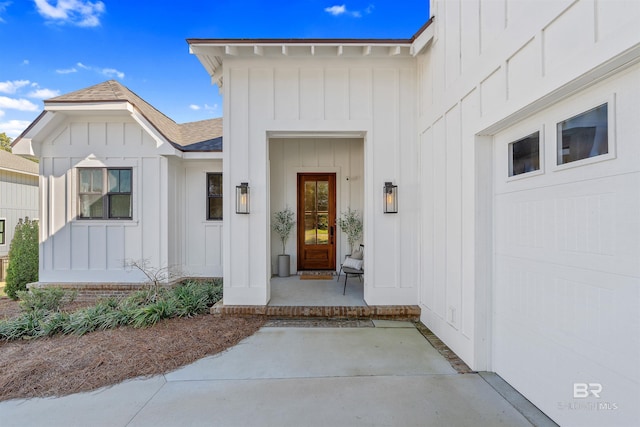 entrance to property featuring a garage