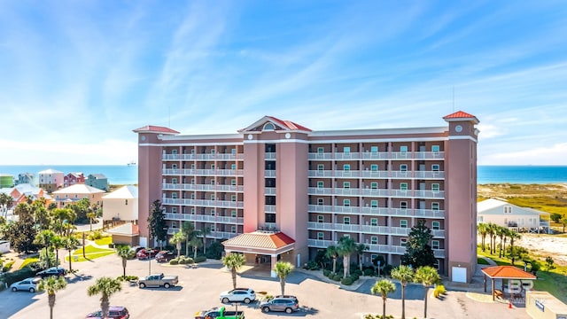 view of building exterior with a water view