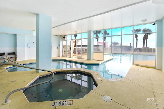 community pool with an indoor in ground hot tub