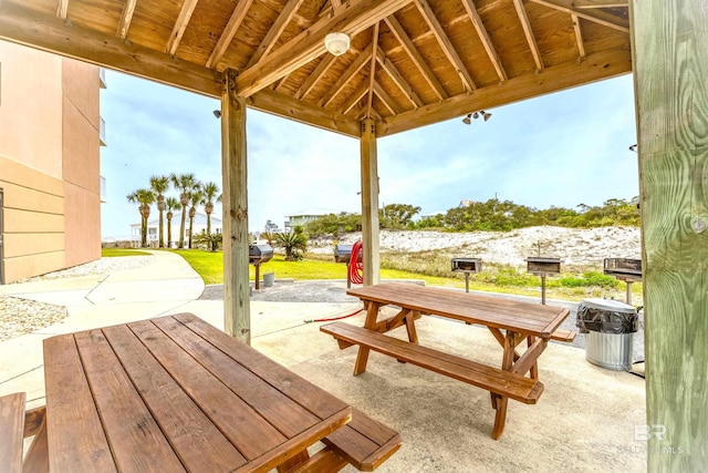 view of patio / terrace with a gazebo and outdoor dining area