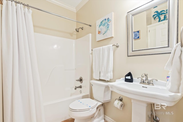 bathroom with toilet, crown molding, and shower / tub combo with curtain