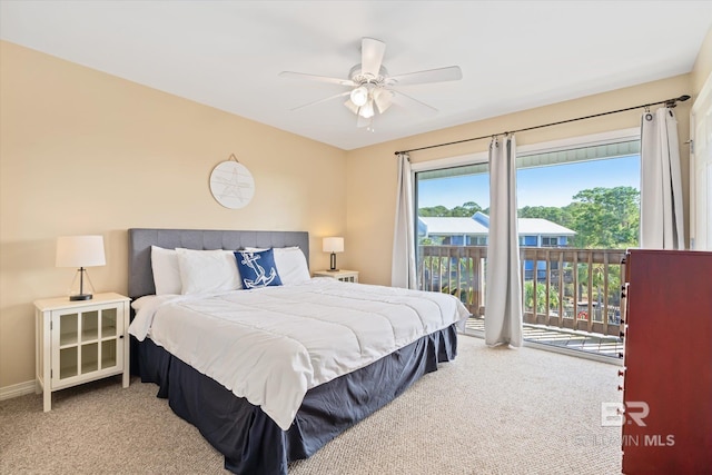 bedroom with access to exterior, light colored carpet, and ceiling fan