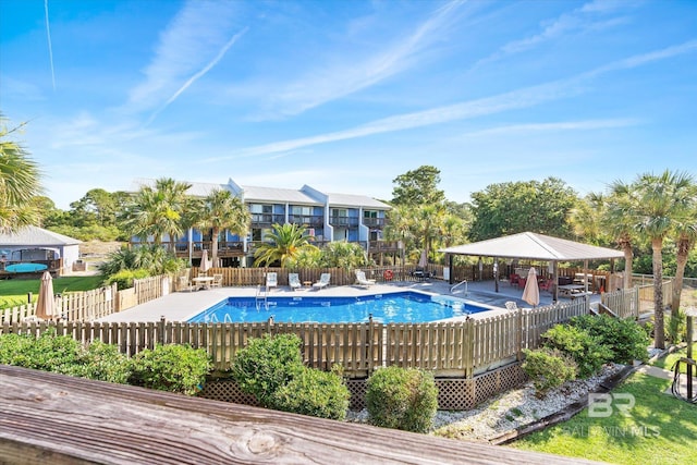 view of swimming pool with a gazebo