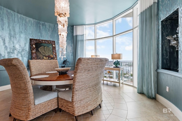 26302 Perdido Beach Blvd Unit D2201, Orange Beach, AL 36561 - dining room featuring floor to ceiling windows, tile patterned flooring, and baseboards