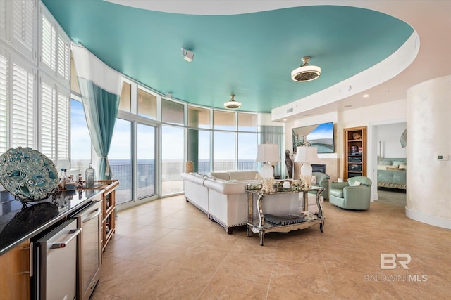 26302 Perdido Beach Blvd Unit D2201, Orange Beach, AL 36561 - living area with light tile patterned floors and a fireplace