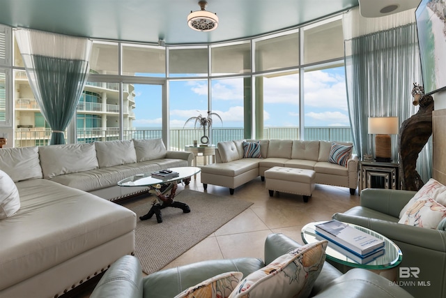 26302 Perdido Beach Blvd Unit D2201, Orange Beach, AL 36561 - living room with light tile patterned flooring and a water view