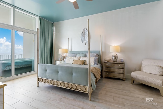 26302 Perdido Beach Blvd Unit D2201, Orange Beach, AL 36561 - bedroom featuring access to outside, wood finished floors, and ceiling fan