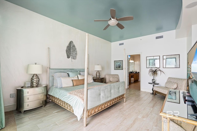 26302 Perdido Beach Blvd Unit D2201, Orange Beach, AL 36561 - bedroom with light wood-style flooring, a high ceiling, and ceiling fan