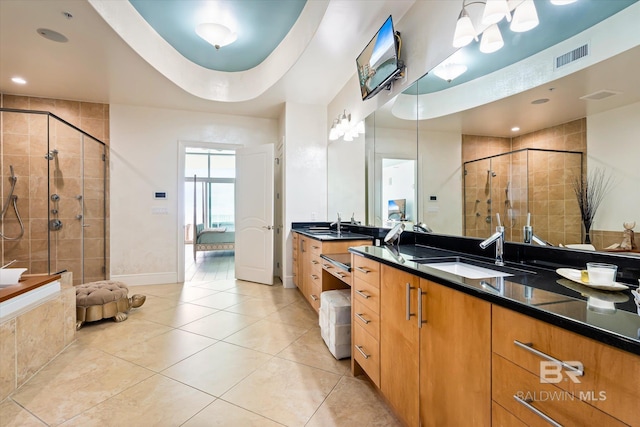 26302 Perdido Beach Blvd Unit D2201, Orange Beach, AL 36561 - full bathroom featuring a shower stall, vanity, tile patterned floors, and baseboards