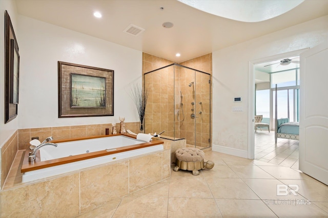 26302 Perdido Beach Blvd Unit D2201, Orange Beach, AL 36561 - full bath with a tub with jets, a shower stall, ensuite bathroom, tile patterned floors, and ceiling fan