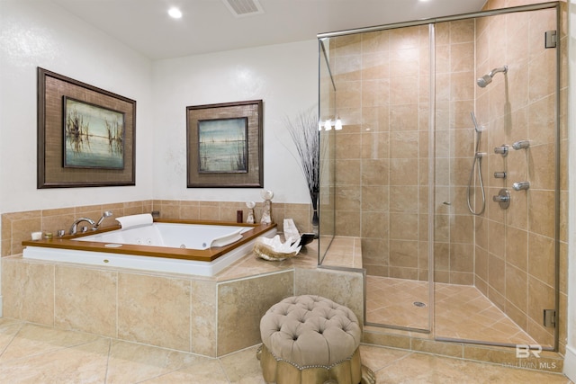 26302 Perdido Beach Blvd Unit D2201, Orange Beach, AL 36561 - bathroom featuring a stall shower, a whirlpool tub, tile patterned floors, and recessed lighting