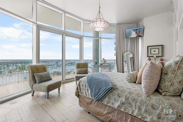 26302 Perdido Beach Blvd Unit D2201, Orange Beach, AL 36561 - bedroom featuring a wall of windows and a water view