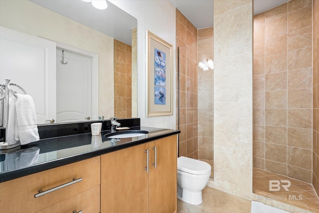 26302 Perdido Beach Blvd Unit D2201, Orange Beach, AL 36561 - full bathroom with toilet, vanity, tile patterned flooring, and a walk in shower