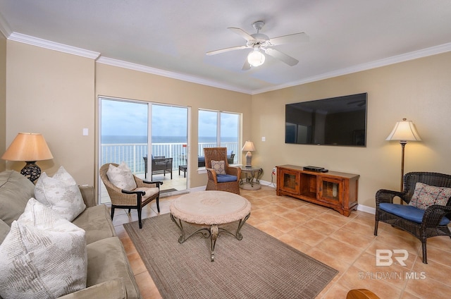 living room with light tile patterned floors, ceiling fan, and ornamental molding