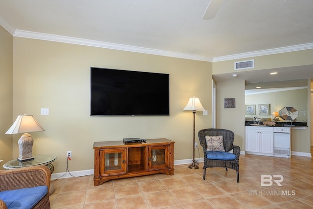 tiled living room featuring crown molding