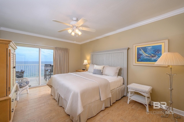 bedroom featuring access to exterior, ceiling fan, crown molding, light hardwood / wood-style floors, and a water view