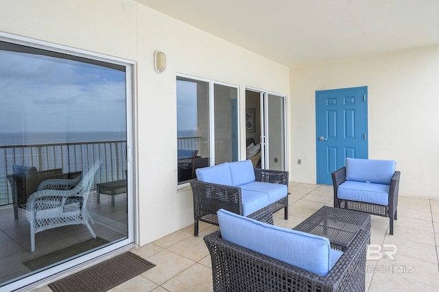 view of patio / terrace featuring an outdoor hangout area and a water view
