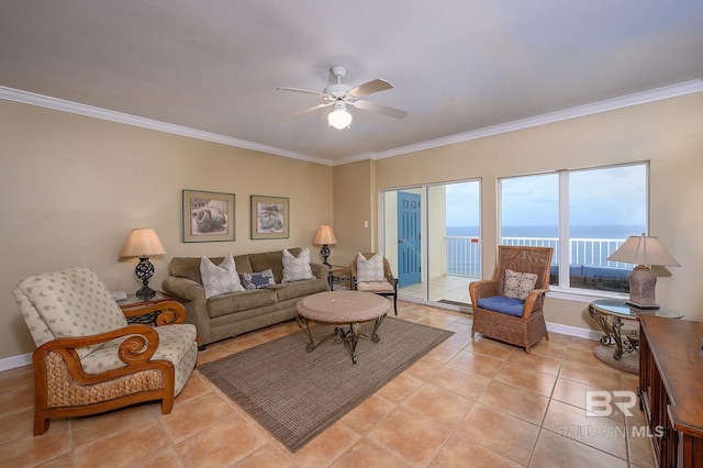 tiled living room with a water view, ceiling fan, and ornamental molding