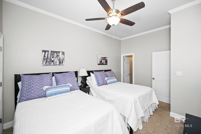 carpeted bedroom featuring ceiling fan and crown molding